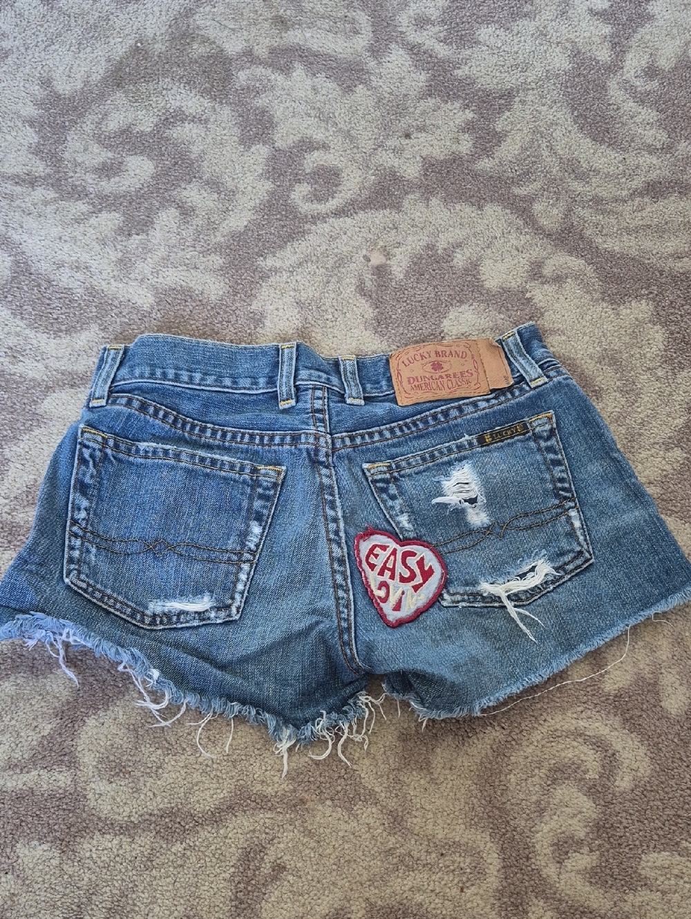 Lucky Brand Distressed Blue Denim Cutoff Shorts with Red 'Easy' Heart Patch
